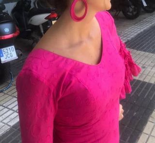 Traje de flamenca rosa.