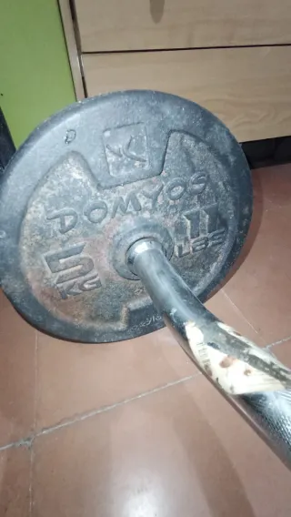 Equipo de gimnasio multifuncional y pesas