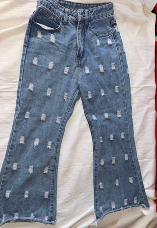 Pantalón vaquero desgastado