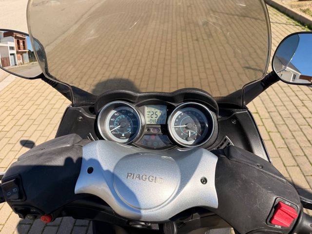 Piaggio X Evo 250 ie de color Gris. 48.211 Km.