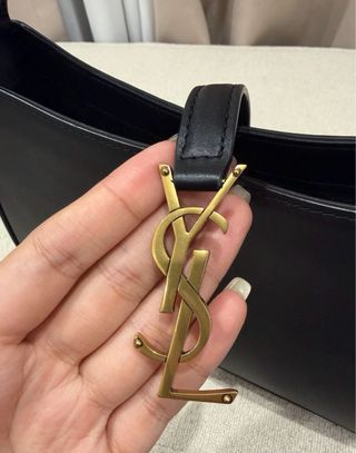 Bolso YSL Hobo Negro y Dorado