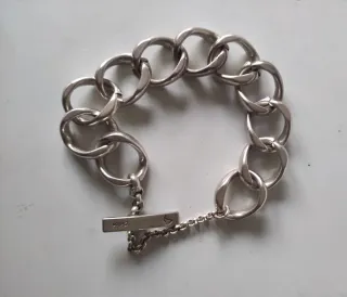 Pulseras Ciclón y Uno de 50 Plata