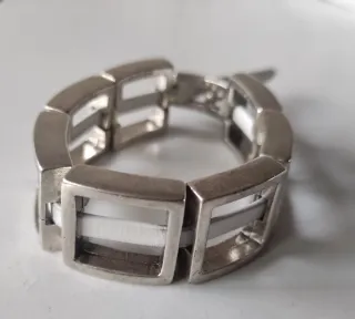 Pulseras Ciclón y Uno de 50 Plata