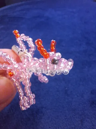 Accessorio per cellulare draghetto rosa