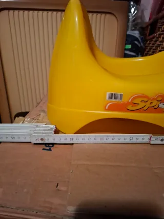 Vasino cavalcabile giallo con manubrio