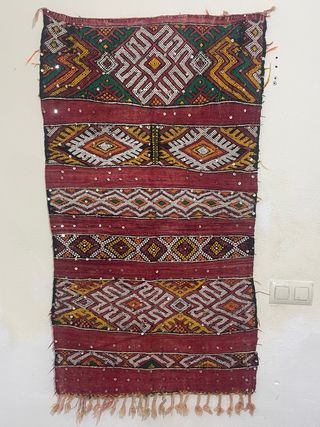 Alfombra antigua tejida a mano