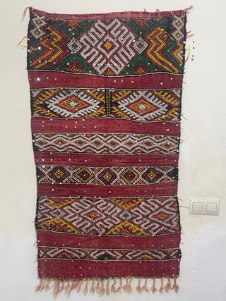 Alfombra antigua tejida a mano