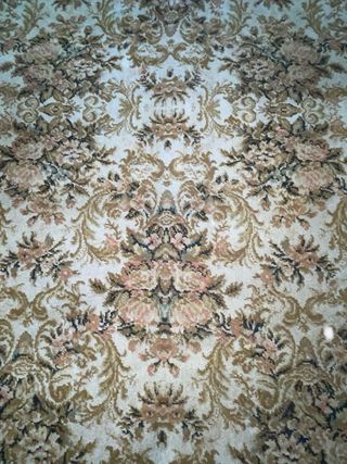 Alfombra antigua floral beige y marrón