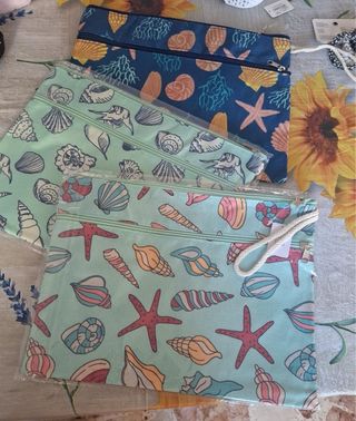 Pochette grandi con fantasia conchiglie