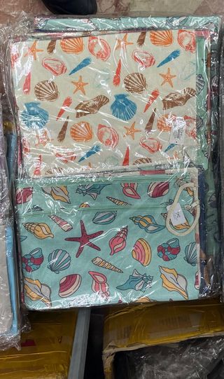 Pochette grandi con fantasia conchiglie