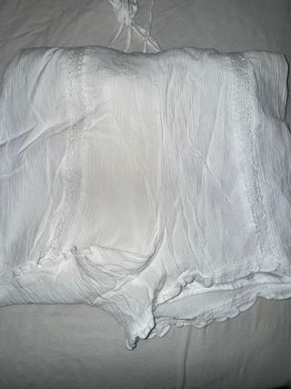 Mono blanco de tirantes