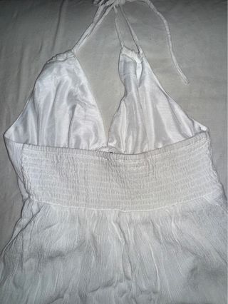 Mono blanco de tirantes