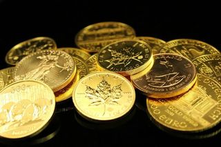 Diferentes monedas de oro,toda la peso spotdel día