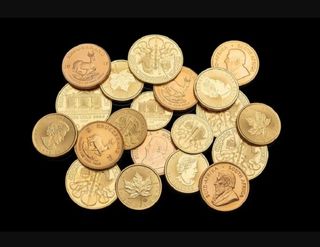 Diferentes monedas de oro,toda la peso spotdel día
