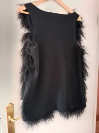 Chaleco de  pelo negro de cordero.Cold Alaska