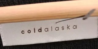 Chaleco de  pelo negro de cordero.Cold Alaska