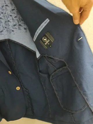 Americana azul con estampado de flamencos