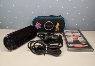 PSP 3000 Nero + Gioco + Regalo AR-K 2.gb