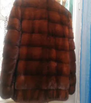 Pelliccia orizzontale calda con cerniera