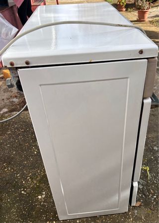 Cocina gas butano con horno y placa eléctrica