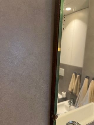 Espejo antiguo de cristal y metal