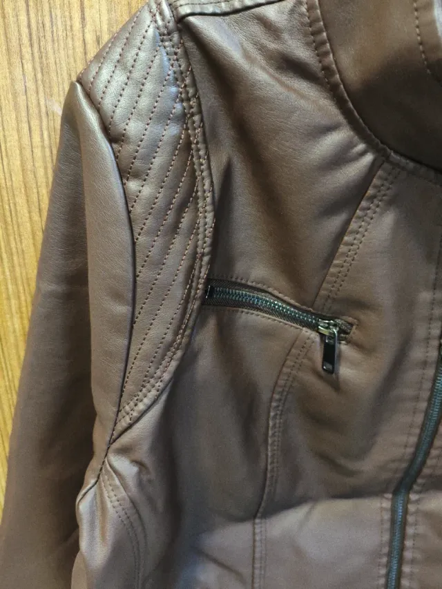 Nuova giacca in similpelle di alta qualità