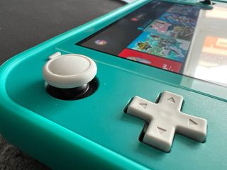 Nintendo Switch Lite Turchese + 3 GIOCHI