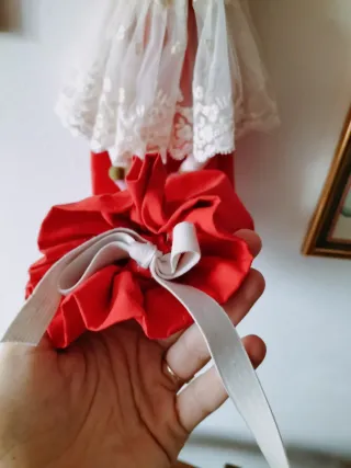 Bambola porta sacchetti in stoffa