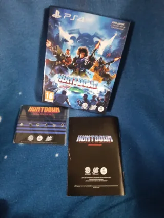 HUNTDOWN PS4 NO TRAE JUEGO SOLO CAJA Y EXTRAS!!!!!