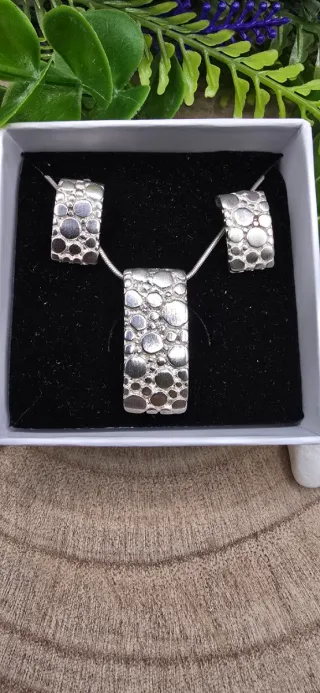 Set di gioielli in argento con ciondolo e orecchini