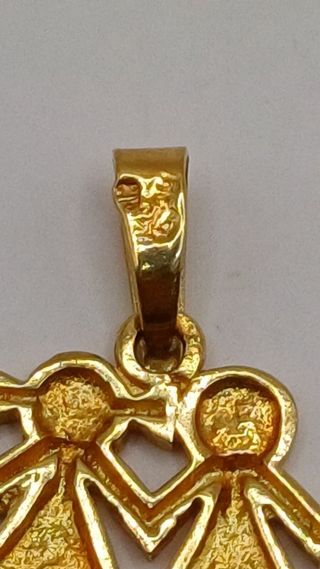 Colgante niños de oro 18k, 1,58gr. Ref. G-944.