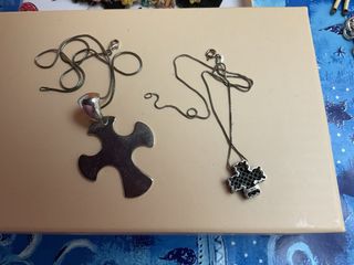 Collane donna: bambola, croci, perle