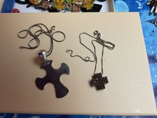 Collane donna: bambola, croci, perle