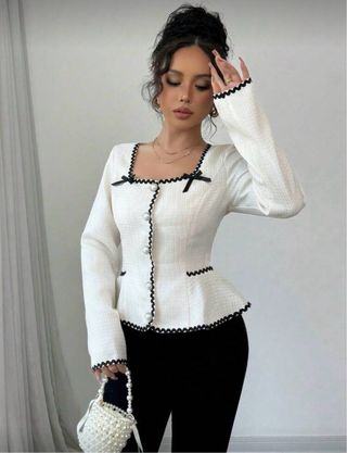 Blusa elegante de mujer con cintura ceñida