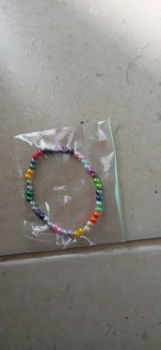 Pulseira feita à mão de missangas