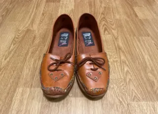 Zapatos bajos piel marrones