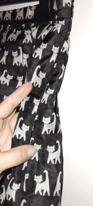 Falda palas con  vuelo gatos T.S