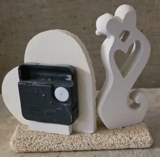 Orologio in Pietra Leccese con Coppia