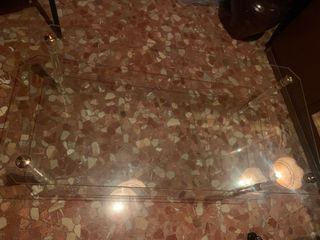 Mesa centro cristal y metal dorado