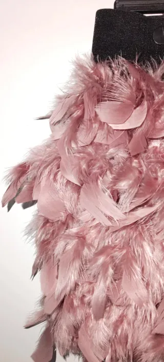 Falda mini Stradivarius plumas rosa T. S