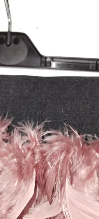 Falda mini Stradivarius plumas rosa T. S