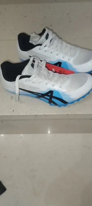 Zapatillas Atletismo Blancas y Azules