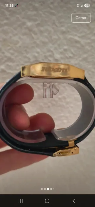 Reloj Nixon Negro y Dorado