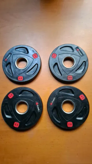 Conjunto de pesas y material de gimnasio