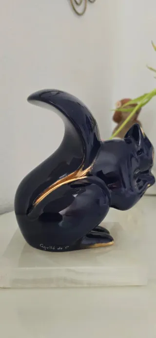 Ardilla porta Celi Agulló de C. Oro 24K