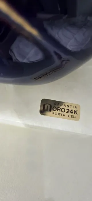 Ardilla porta Celi Agulló de C. Oro 24K