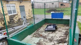 Remolque verde con rejilla