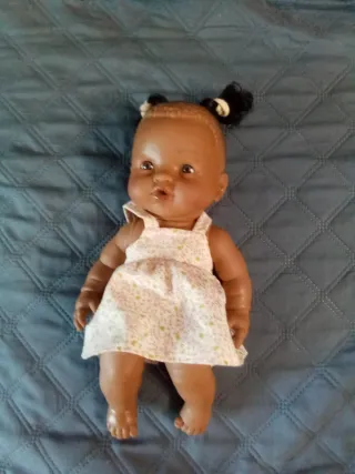 Muñeco bebé de peluche