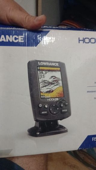 Kayak con dos remos, sonda y chaleco salvavidas.