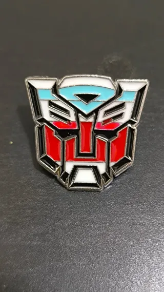 Juego 2 pins Transformers